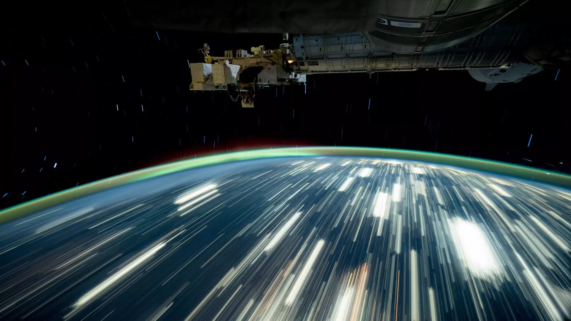 NASA Space Technology a view of earth with long streaks of light