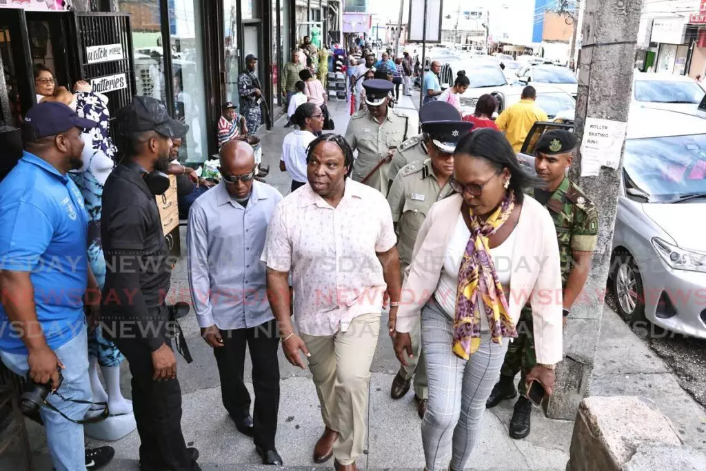 Politics tamfitronics Minister in the Ministry of National Security Keith Scotland on a walkabout on High Street, San Fernando, on November 8.  - Photo by Lincoln Holder 