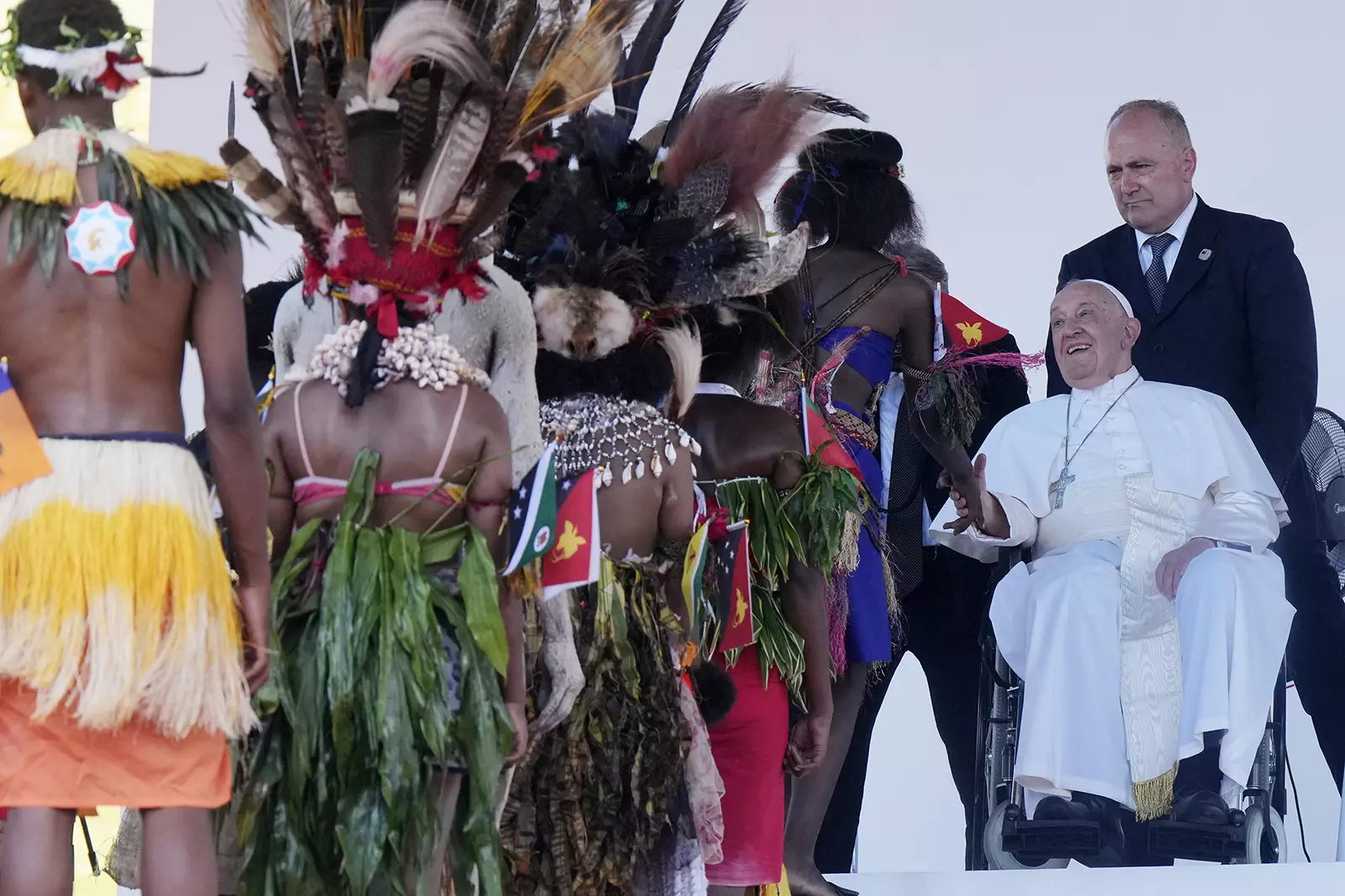 Top Stories Tamfitronics Pope Francis greets people in traditional dress while meeting young people in the Sir John Guise Stadium in Port Moresby, Papua New Guinea, Sept. 9, 2024. (AP Photo/Mark Baker)