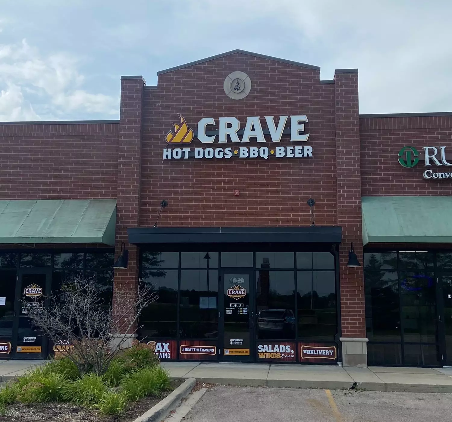 Top Stories Tamfitronics Crave Hot Dogs & BBQ Celebrates its Grand Opening in North Aurora!