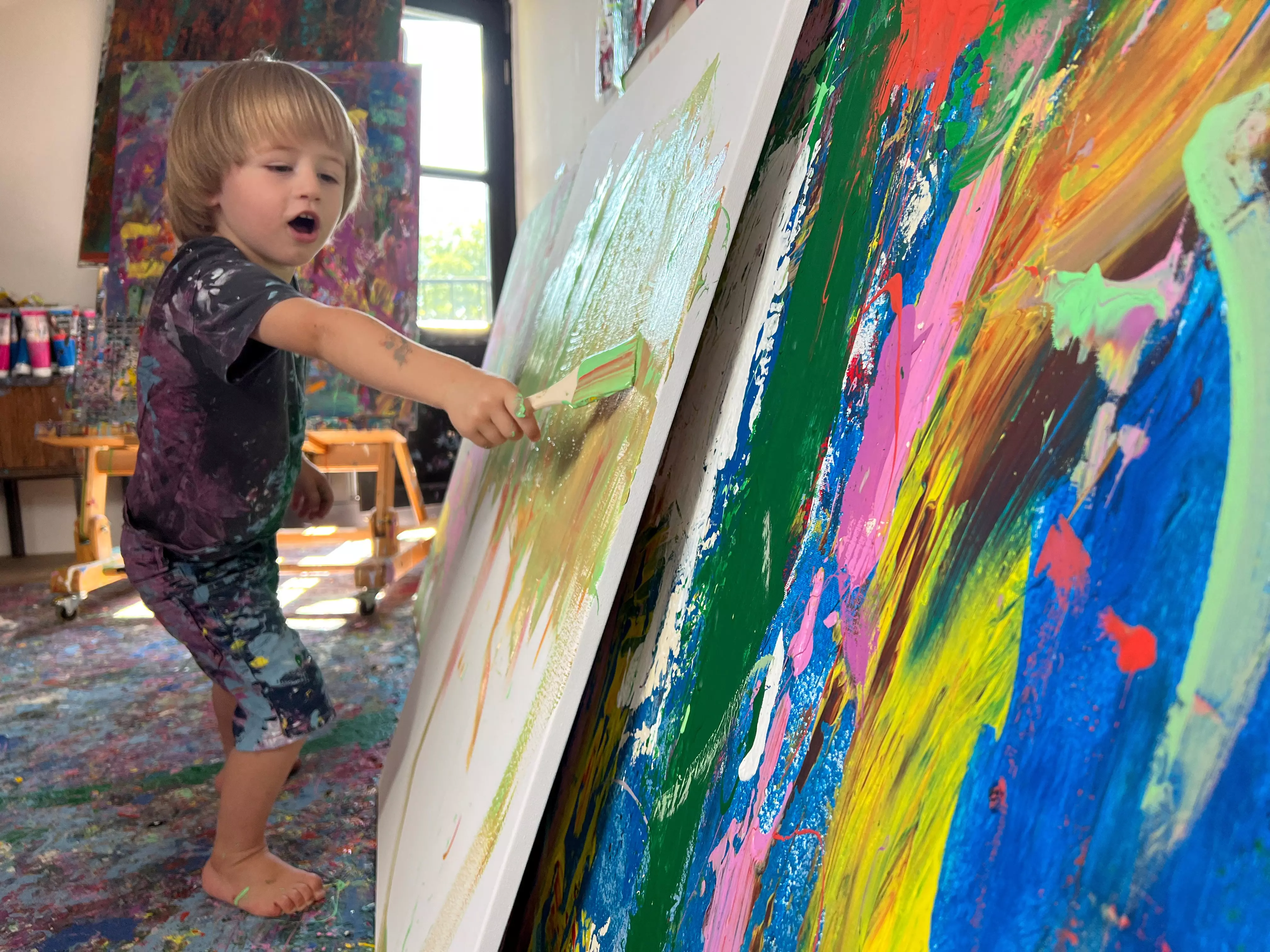 Top Stories Tamfitronics Laurent Schwarz, two, has been dubbed the 'pint-sized Picasso'