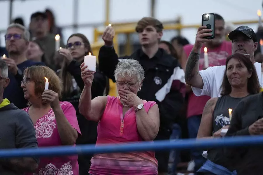 At a candlelight vigil for Trump rally shooting victim, mourners left politics at home